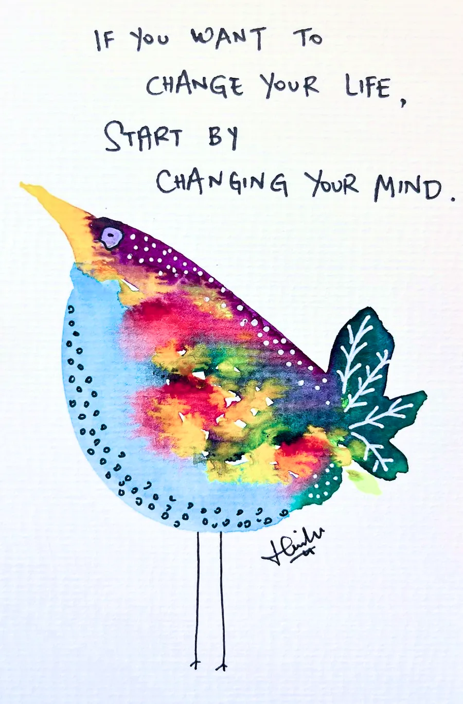 A long-beaked bird washed in rainbow colour, lettered “If you want to change your life, start by changing your mind”