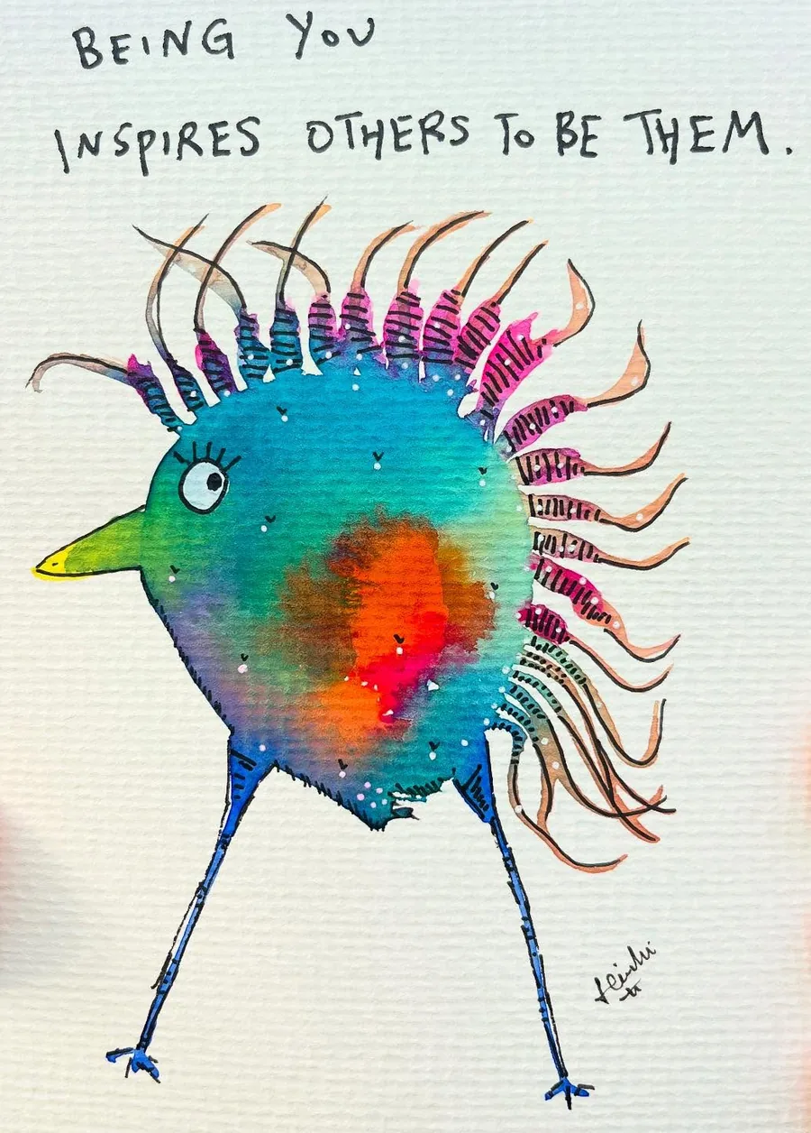 A teal bird with a rainbow crest, lettered “Being you inspires others to be them”